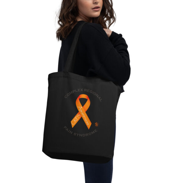 One side of this black tote bag with CRPS Awareness ribbon and Complex Regional Pain Syndrome